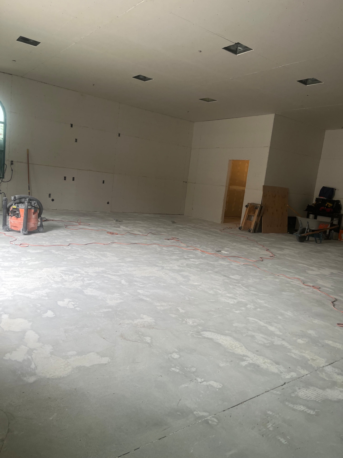 Large commercial suite with finished drywall and clean concrete floor